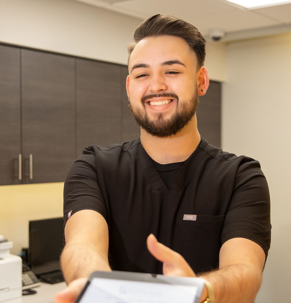 west lake front desk smiling ipad financial